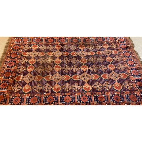 382 - Terracotta ground Afghan carpet with multi repeating geometric designs. 313 x 204cm approx.
(B.P. 21... 