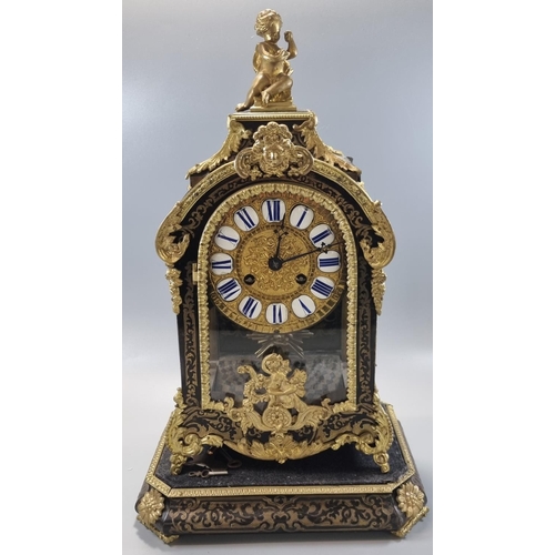 58 - 19th century French boulle mantle clock marked 'F Dumouguie', the arched case with gilt metal cherub... 