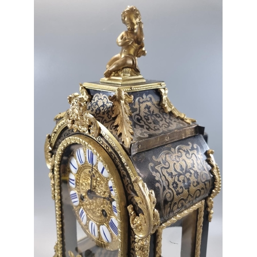 58 - 19th century French boulle mantle clock marked 'F Dumouguie', the arched case with gilt metal cherub... 