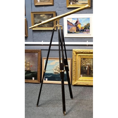 64 - Reproduction brass telescope with folding and adjustable tripod.  Overall length 97cm approx.  (B.P.... 