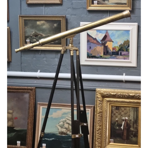 64 - Reproduction brass telescope with folding and adjustable tripod.  Overall length 97cm approx.  (B.P.... 