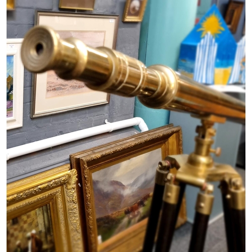 64 - Reproduction brass telescope with folding and adjustable tripod.  Overall length 97cm approx.  (B.P.... 