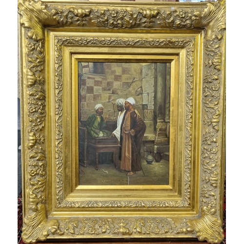 93 - Modern School, Arab figures in conversation, oils on panel.  Heavy gilt frame and slip. 44x33cm appr... 