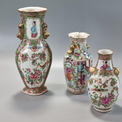 165 - Group of three Chinese porcelain Canton Famille Rose vases, ranging in height from 14.5cm to 23.5cm,... 