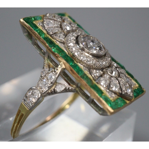 294 - Gold Art Deco diamond and emerald ring of rectangular form, appearing unmarked.  Size M.  4.5g appro... 