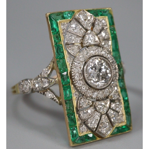 294 - Gold Art Deco diamond and emerald ring of rectangular form, appearing unmarked.  Size M.  4.5g appro... 