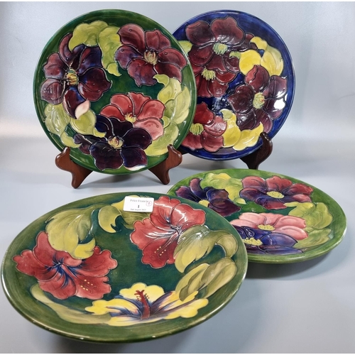 1 - Three Moorcroft pottery tube lined plates, together with a Moorcroft tube lined bowl decorated in 'C... 