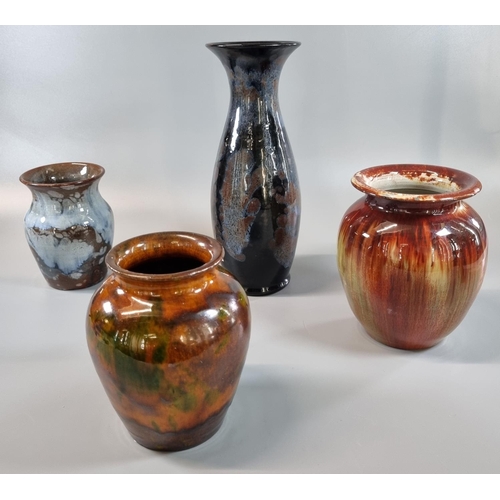 12 - Collection of four Ewenny pottery vases with mottled designs. 
(B.P. 21% + VAT)