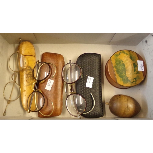 221 - Collection of vintage spectacles some in original cases together with a graduates set of treen acorn... 