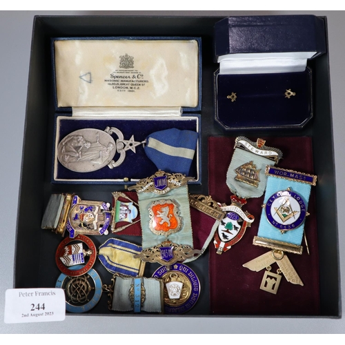 244 - Collection of Masonic regalia to include: two 9ct gold stick pins, hallmarked silver medals/jewels, ... 