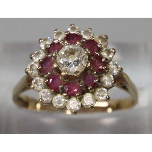 250 - Yellow metal white and red stone cluster ring.  (B.P. 21% + VAT)