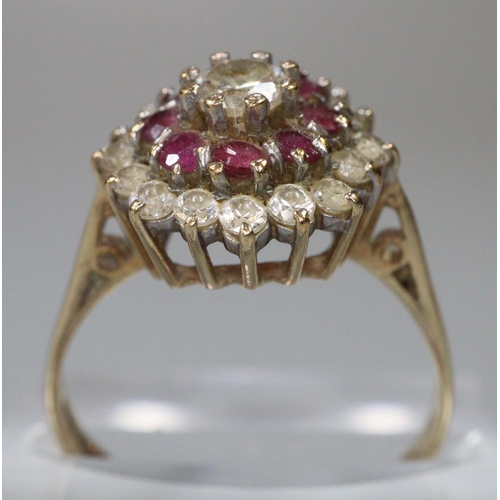 250 - Yellow metal white and red stone cluster ring.  (B.P. 21% + VAT)