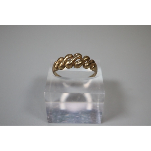 254 - 9ct gold dress ring.  Size N.  1.9g approx.  (B.P. 21% + VAT)