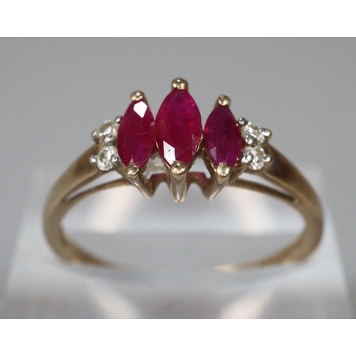 255 - 9ct gold diamond red stone dress ring.  Size M.  1.8g approx. (B.P. 21% + VAT)