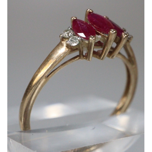 255 - 9ct gold diamond red stone dress ring.  Size M.  1.8g approx. (B.P. 21% + VAT)