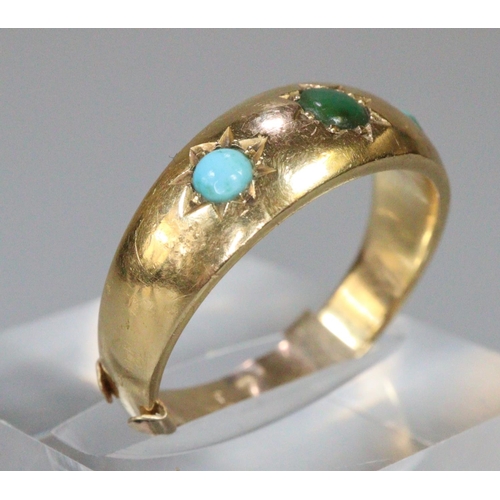 257 - 9ct gold turquoise and green stone dress ring. 5g approx.  (B.P. 21% + VAT)