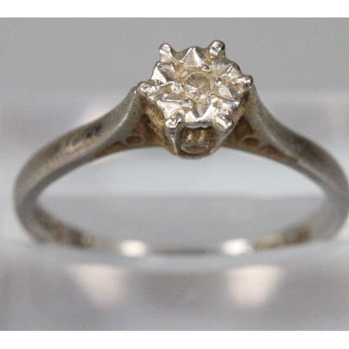 262 - 18ct white gold white stone solitaire ring.  Size M.  2.5g approx.  (does not test as a diamond).  (... 