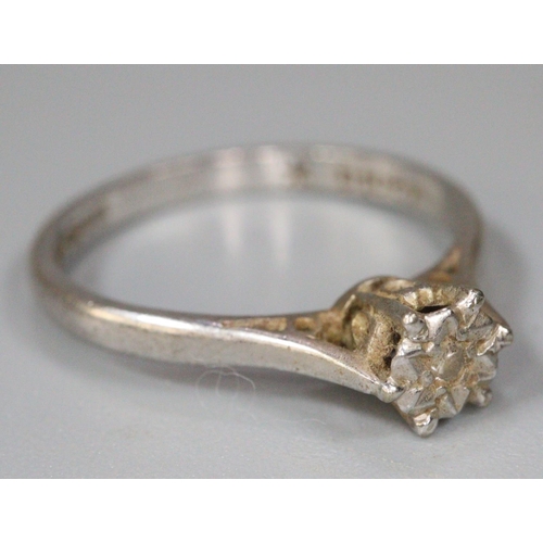 262 - 18ct white gold white stone solitaire ring.  Size M.  2.5g approx.  (does not test as a diamond).  (... 