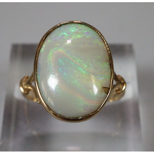 266 - 9ct gold and large opal stone dress ring.  Size L.  2.8g approx.  (B.P. 21% + VAT)