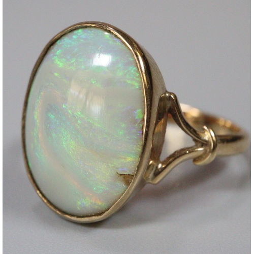 266 - 9ct gold and large opal stone dress ring.  Size L.  2.8g approx.  (B.P. 21% + VAT)