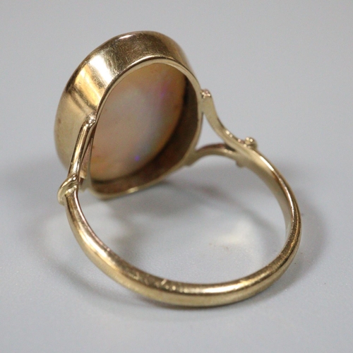 266 - 9ct gold and large opal stone dress ring.  Size L.  2.8g approx.  (B.P. 21% + VAT)