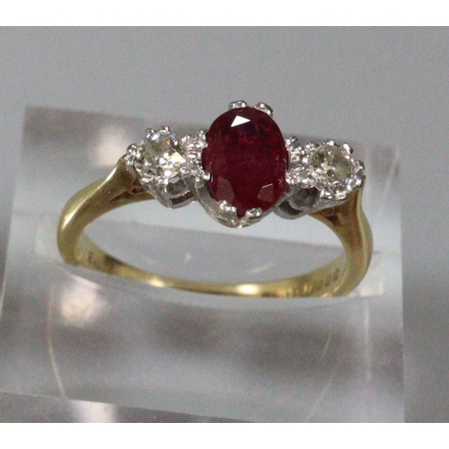 267 - 18ct gold diamond and ruby ring.  Size K.  3.5g approx.  (B.P. 21% + VAT)