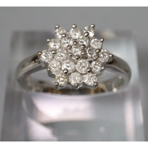 271 - 9ct white gold diamond cluster ring.  Size M.  3.2g approx.  (B.P. 21% + VAT)