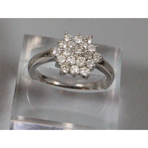 271 - 9ct white gold diamond cluster ring.  Size M.  3.2g approx.  (B.P. 21% + VAT)