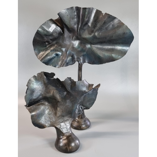 28 - Two modern patinated steel sculptures/door stops worked to represent a tree and a bush.  The highest... 