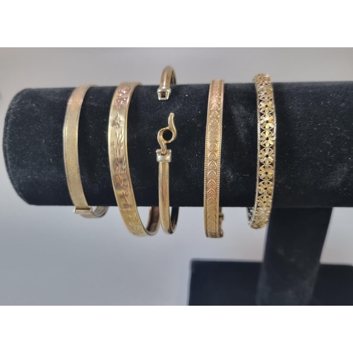 301 - Collection of 9ct gold and rolled gold bangles.  (B.P. 21% + VAT)