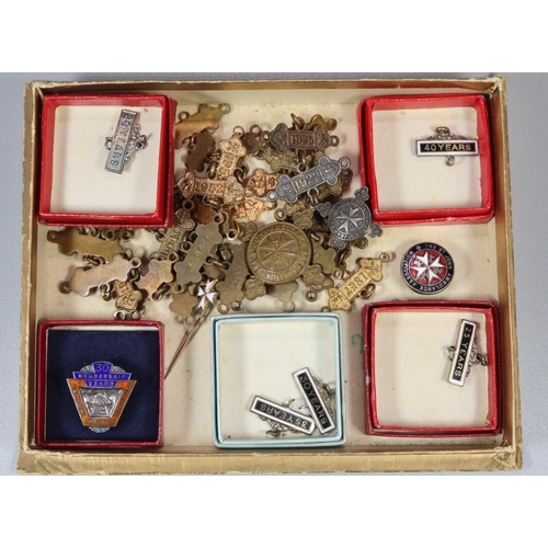 320 - Collection of St John Ambulance and other date bars, pin badges, year badges etc.  (B.P. 21% + VAT)