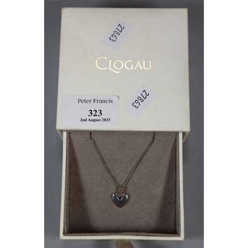 323 - Clogau silver necklace and a silver and gold Clogau Cariad pendant.  (B.P. 21% + VAT)