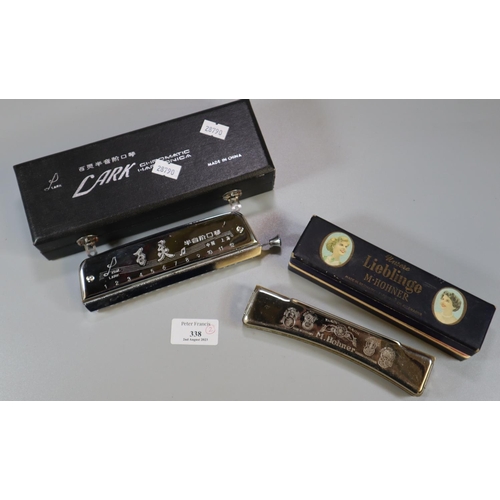 338 - M. Hohner German harmonica in original box together with Lark Chromatic harmonica in original box.  ... 