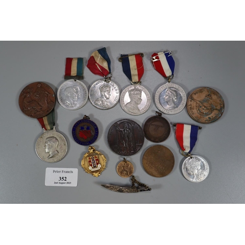 352 - Plastic box of assorted medals, medallions etc.  including: Our Empire Prince May 1929, L W Jenkins ... 