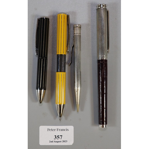 357 - Plastic box of assorted items to include: two Thomas Lyte 925 silver designer pens, Aspinal of Londo... 