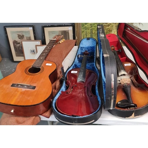 481 - Acoustic guitar (no strings) together with  two student violins in hard cases.  (3)  (B.P. 21% + VAT... 