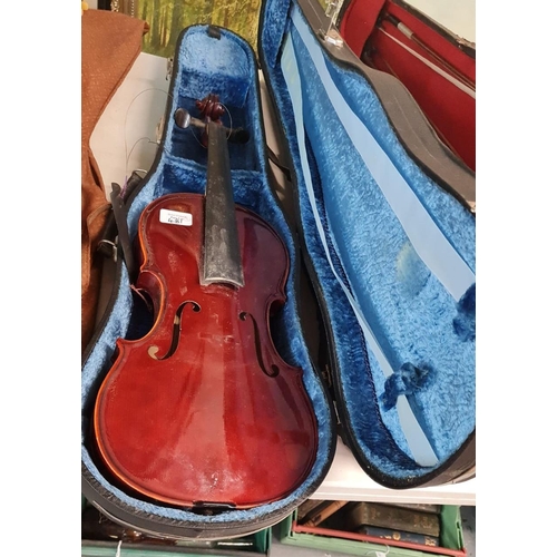 481 - Acoustic guitar (no strings) together with  two student violins in hard cases.  (3)  (B.P. 21% + VAT... 