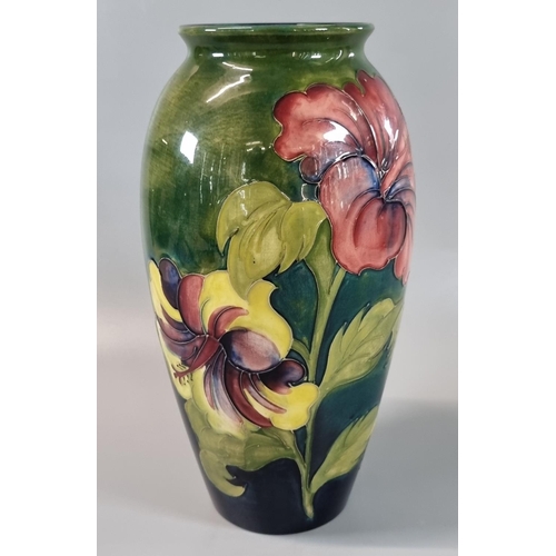 5 - Moorcroft pottery tube lined green ground Hibiscus vase of ovoid form. Impressed and painted initial... 