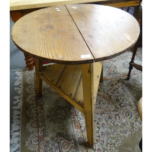 554 - Victorian pine cricket table with under shelf.  71cm diameter x 77cm high approx.  (B.P. 21% + VAT)