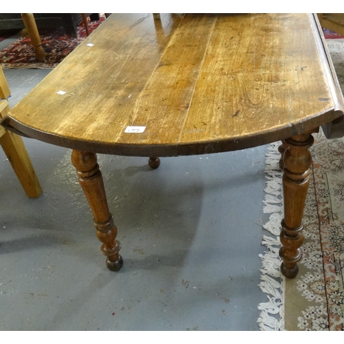 556A - French cherrywood dropleaf table on baluster turned legs. 123cm approx. (B.P. 21% + VAT)