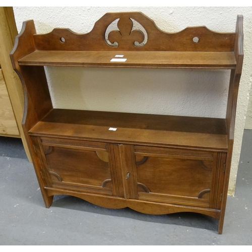 568 - Early 20th century hanging wall cabinet with carved fleur de lis decoration.  (B.P. 21% + VAT)