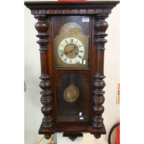 573 - Early 20th century stained walnut two train Vienna type wall clock, with key and pendulum.  (B.P. 21... 