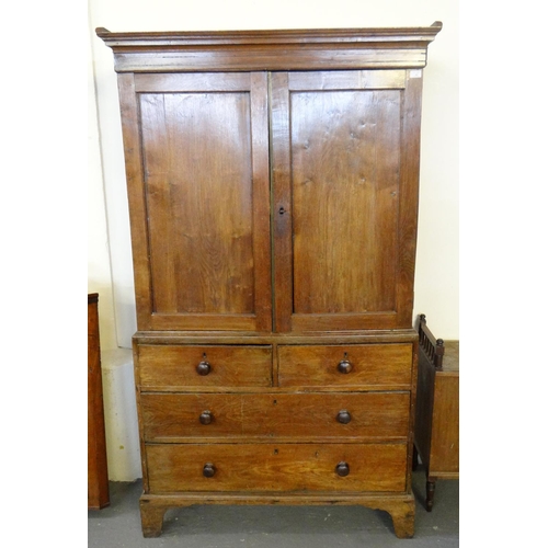 582 - 19th century oak two stage press cupboard having an arrangement of two short and two long drawers on... 