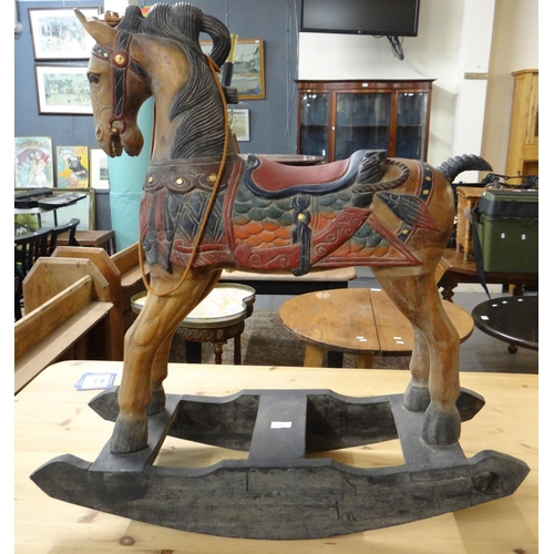 590 - Hand carved wooden child's rocking horse. Possibly Malaysian.  (B.P. 21% + VAT)