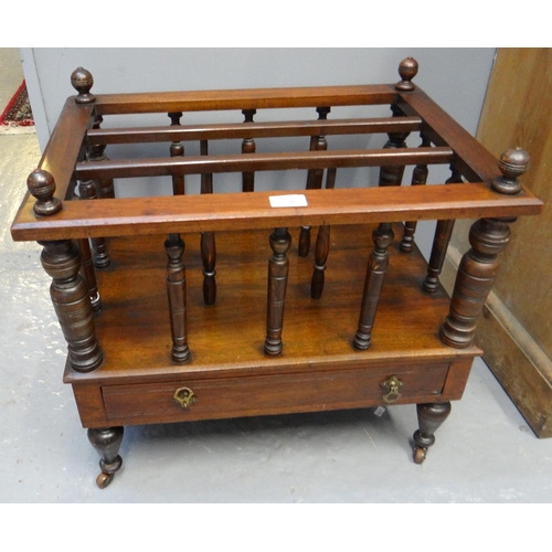 591 - Edwardian mahogany music Canterbury with under drawer on turned legs and ceramic casters. 55cm wide ... 