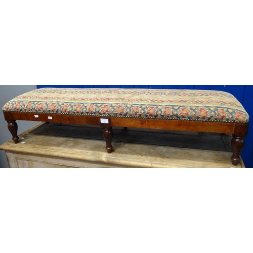 593 - 20th century tapestry upholstered fender stool with stained frame on baluster turned tapering legs. ... 