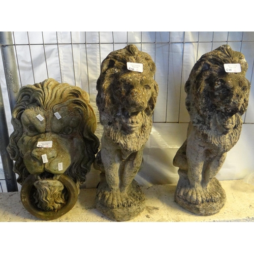 610 - Pair of reconstituted stone garden lions, reconstituted stone lion mask wall panel and a novelty rec... 