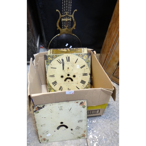 615 - Large brass clock pendulum and two 19th century painted clock faces.  (3)  (B.P. 21% + VAT)