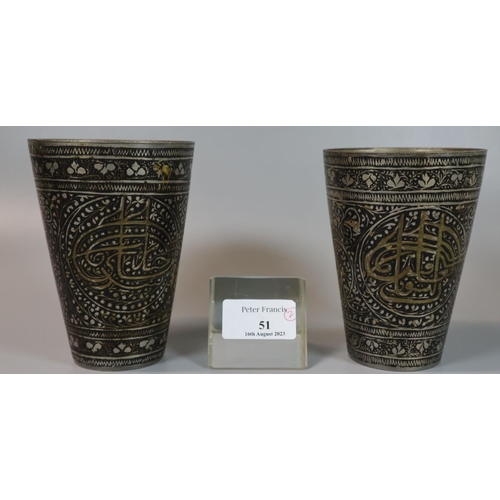 51 - A pair of Indian engraved and enamel inlaid 'Lassi' cups with gilt Islamic calligraphy. Early to mid... 