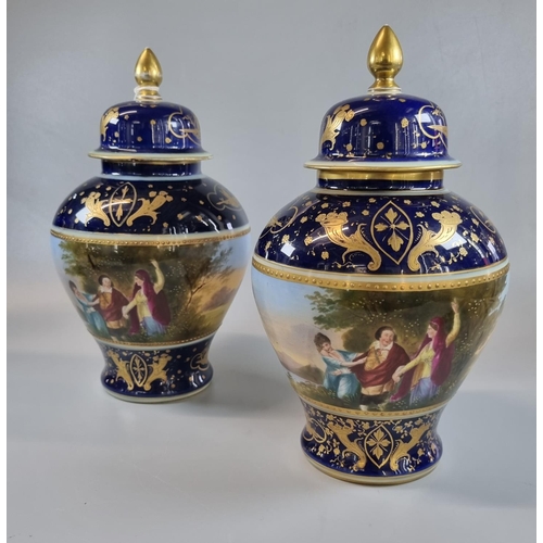 10 - A pair of Vienna porcelain style baluster shaped lidded vases and covers, each having continuous pri... 